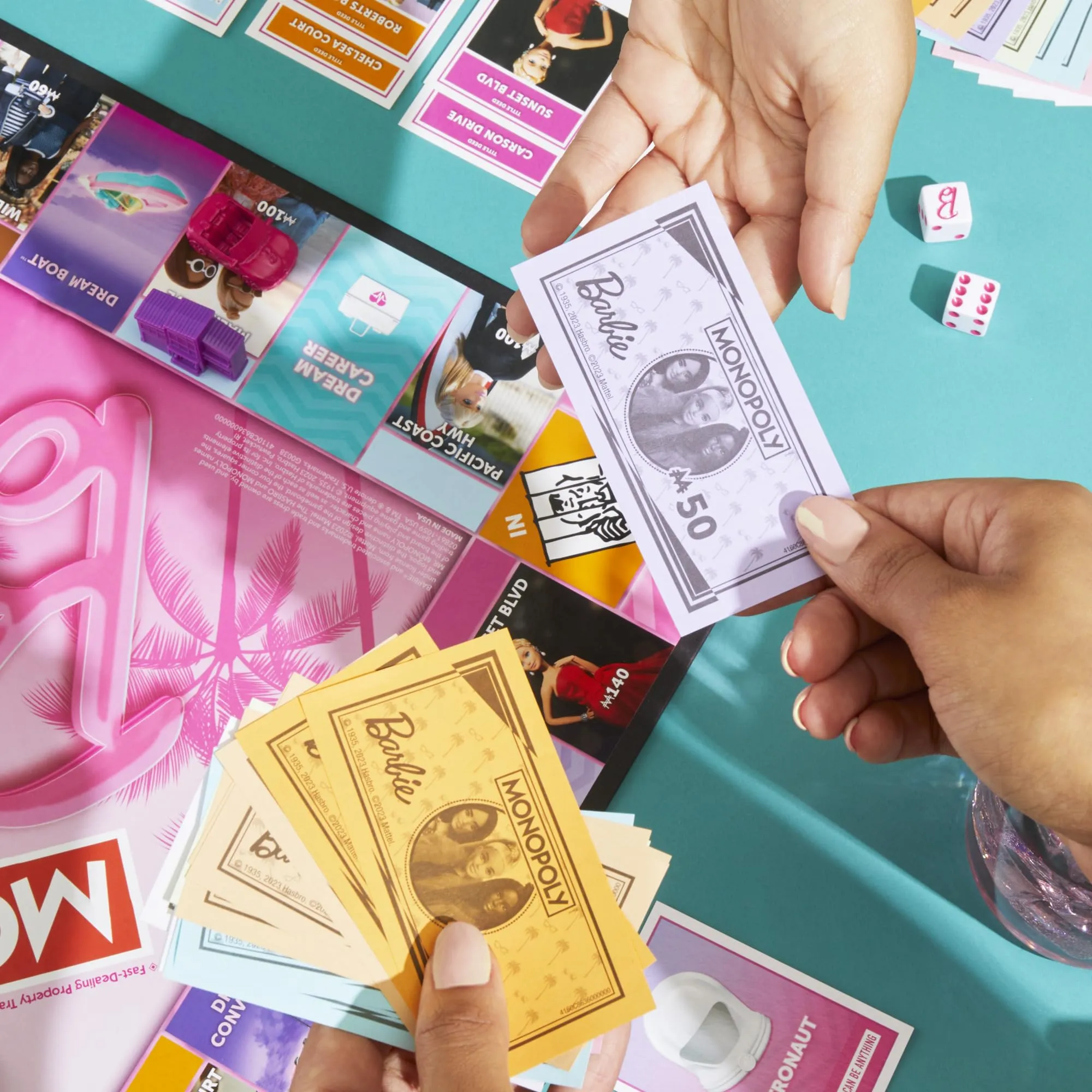 Monopoly: Barbie Edition Board Game, Ages 8 , 2-6 Players, Fun Family Games for Kids and Adults, with 6 Barbie-Themed Pink Zinc Tokens, Kids Gifts