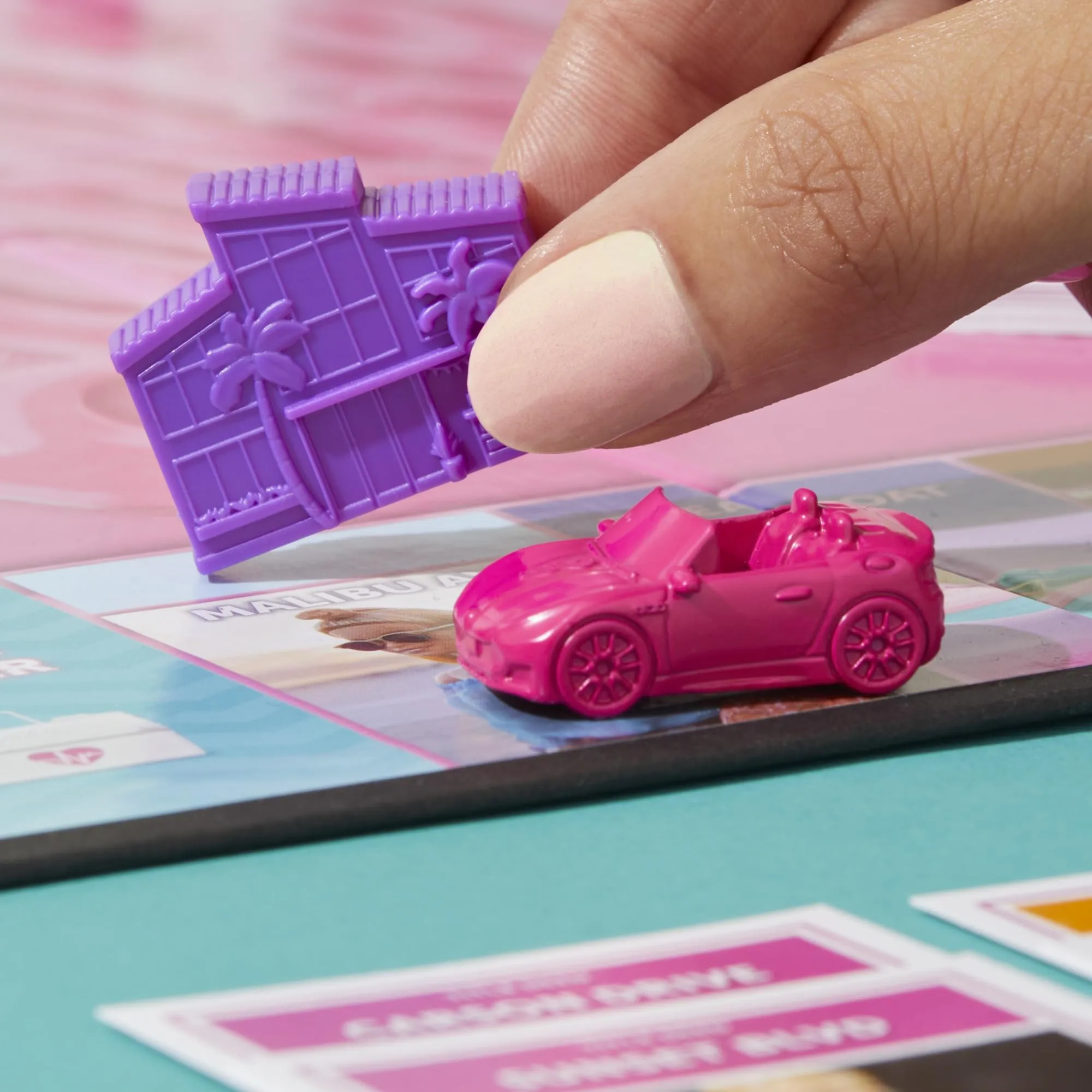 Monopoly: Barbie Edition Board Game, Ages 8 , 2-6 Players, Fun Family Games for Kids and Adults, with 6 Barbie-Themed Pink Zinc Tokens, Kids Gifts